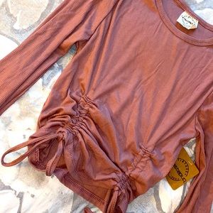 Size Small Pink long sleeved scrunch tied crop top